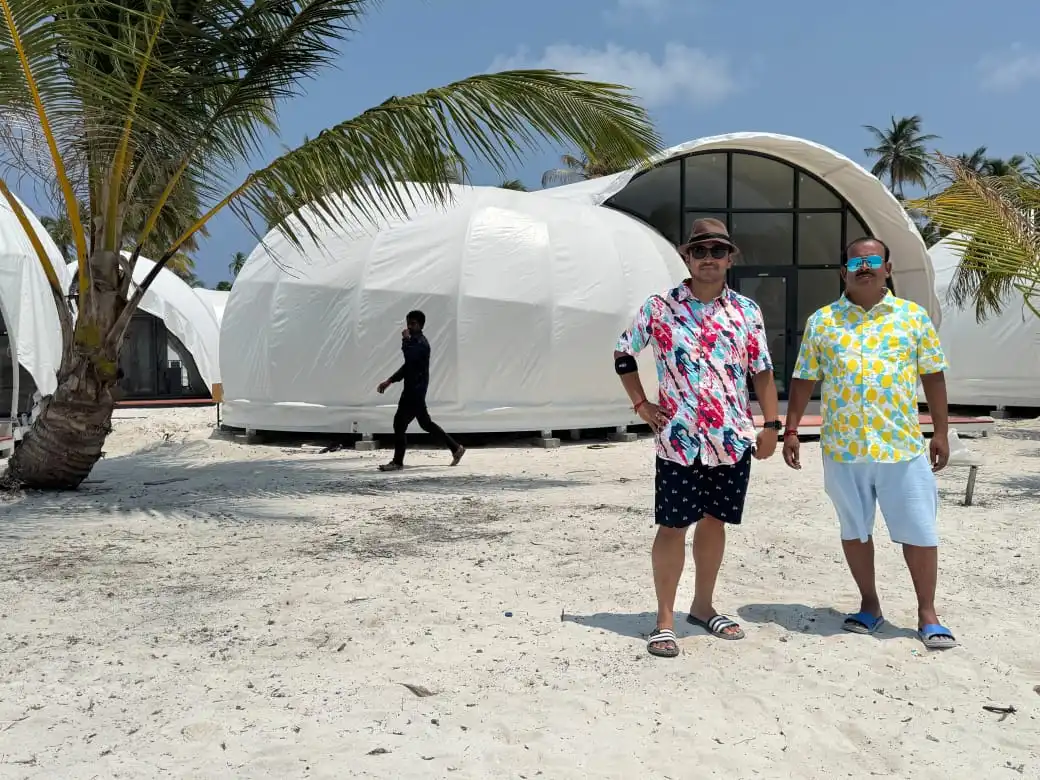 happy guest at tent city bangaram with Touristhub Holidays