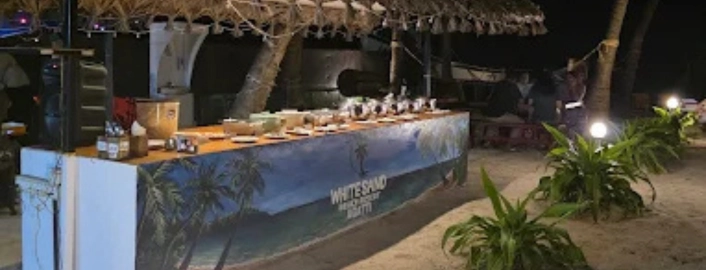 happy guest at White Sand resort agatti with Touristhub Holidays